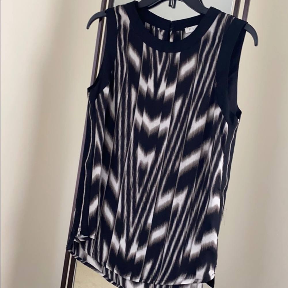 FRNCH top. Lightly used. Modern motif.